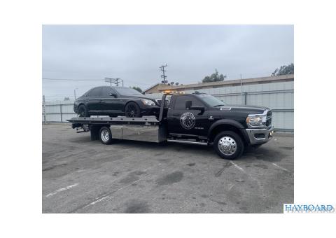Towing & Roadside Services Flat Bed Tow Truck